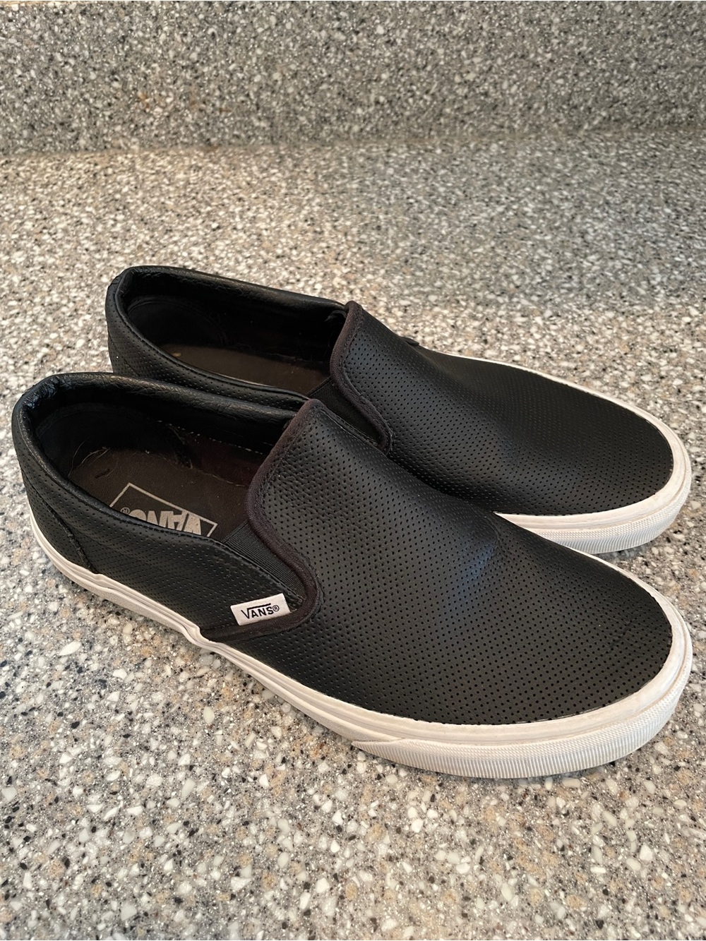 Vans Black Perforated Leather Classic Slip-Ons - M 8.5 / W 10